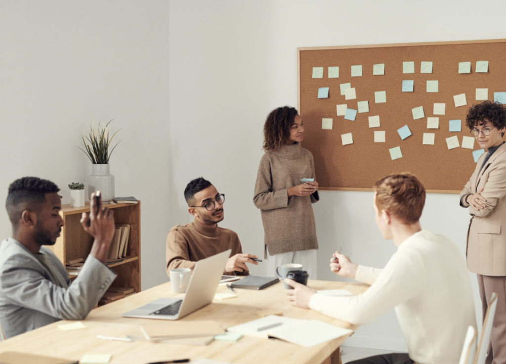 Employees brainstorming with sticky notes