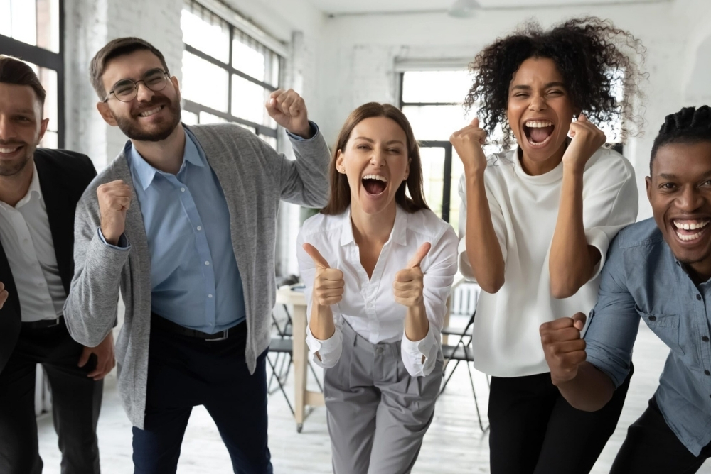happy employees engaging together for success