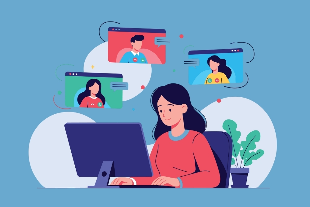 Employee collaborating with teammates through video calls while working remotely