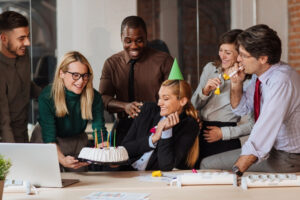 Workplace recognition moment showing employee appreciation and engagement
