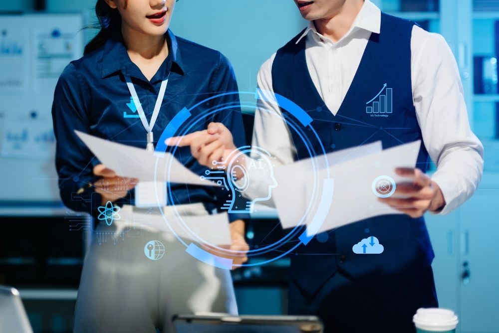 HR professionals reviewing employee feedback with AI-powered workforce insights